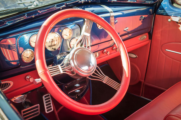 An interior of a car showing leather seats triming
